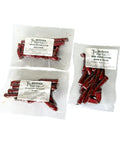 Three packages of beef snack sticks ends & pieces of varying flavors like original, teriyaki and cheese & peppers from Mershon Cattle on a white background