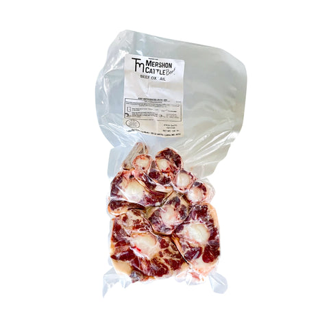 Packaged beef oxtail with Mershon Cattle label on a white background