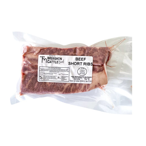 Packaged beef short ribs with a Mershon Cattle label on a white background