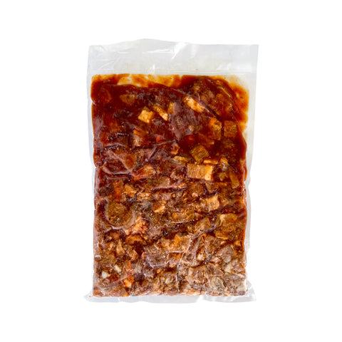 Packaged BBQ Beef with sauce in a clear plastic bag on a white background