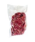 Packaged raw meat on a white background