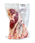 Vacuum-sealed beef tri tip package with Mershon Cattle Beef label on a white background